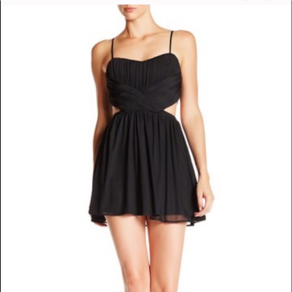 Steppin Out- Woman’s Ruched Cut Out Mini Dress